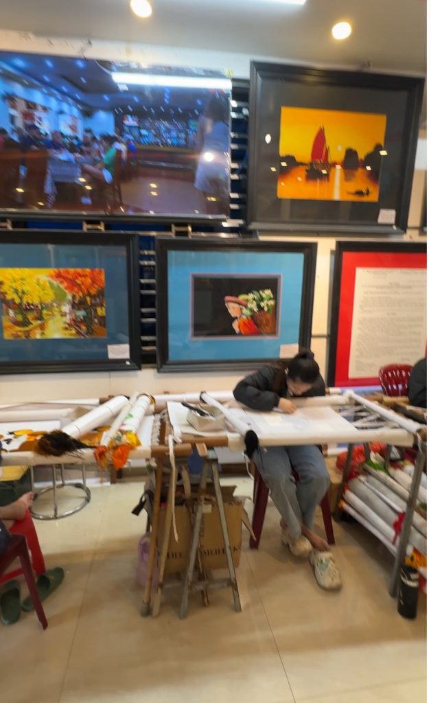 Young women embroidering in the rest area building 